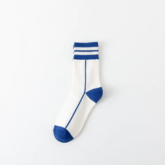 Marineblaue Socken Frauen mit mittlerer Röhren gestreiftes trendige Socken Brief lässige Baumwollsocken Männer und Frauen Paar Socken