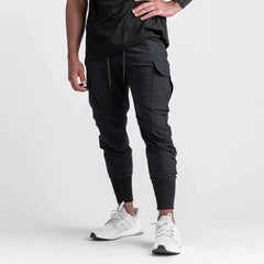 Jogger Nuovo fitness pantaloni sportivi maschili streetwear pantaloni casual all'aperto cotone pantaloni maschi di moda marca abbigliamento da uomo