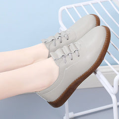 Chaussures blanches à fond doux Femmes Hollow Mom chaussures petites chaussures en cuir chaussures de pois décontractés femmes plus taille