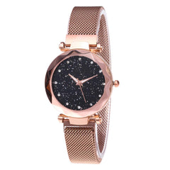 Reloj de cuarzo femenino elegante con cristal y cielo estrellado