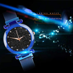 Reloj de cuarzo femenino elegante con cristal y cielo estrellado